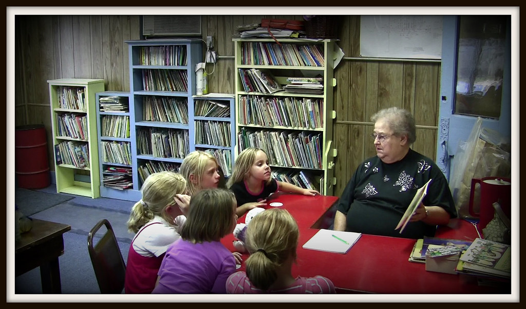 Children enjoying story hour reading together
